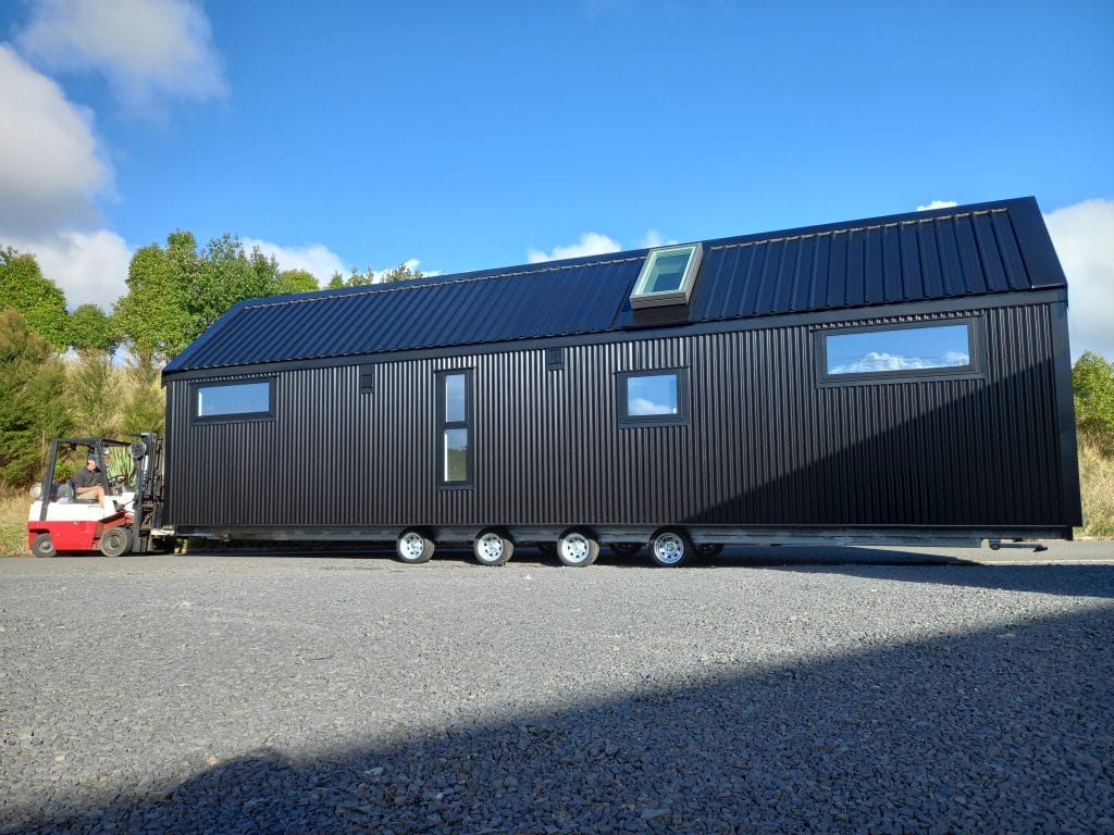 The Everest XL - 13.5 Meter Long Tiny Home leaving the Fox Cabins factory at Raglan