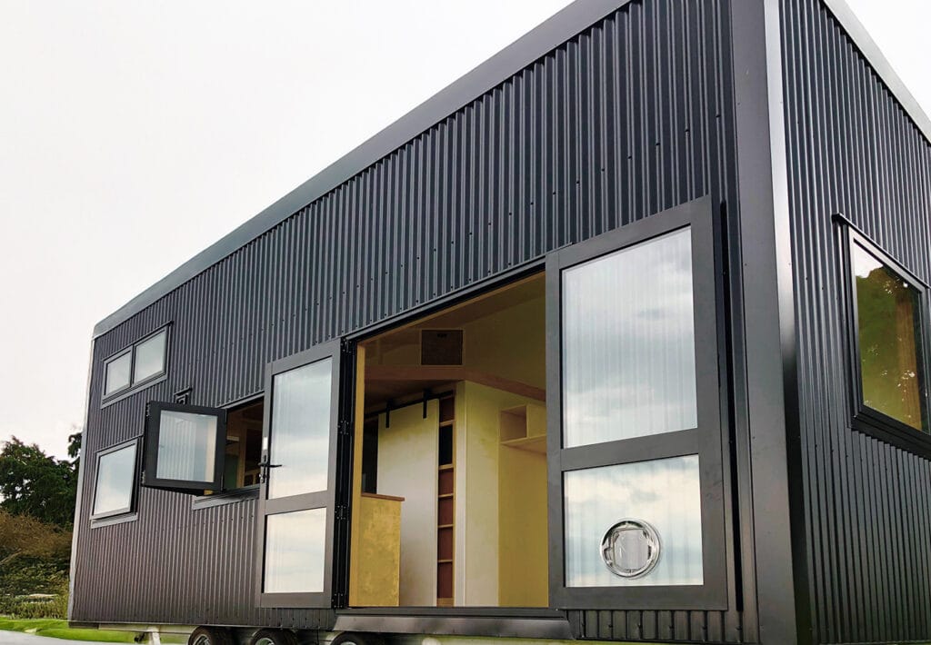 Aspiring 2 Bedroom Tiny Home in ebony colorsteel by Fox Cabins, Raglan